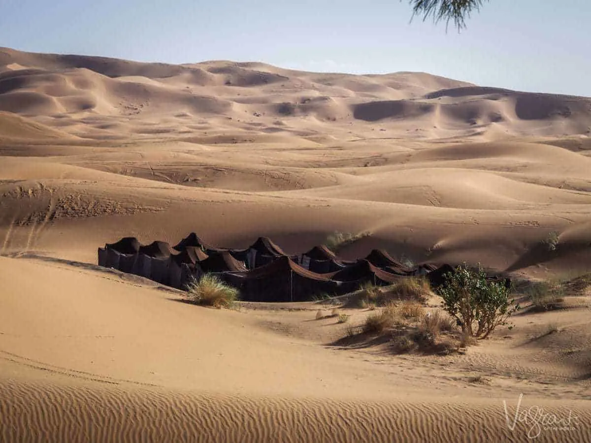 A guide to a road trip in Morocco Marrakech toFez - A Berber Camp, a cluster of brown tents nestled amongst the sand dunes in the Sahara Desert Morocco