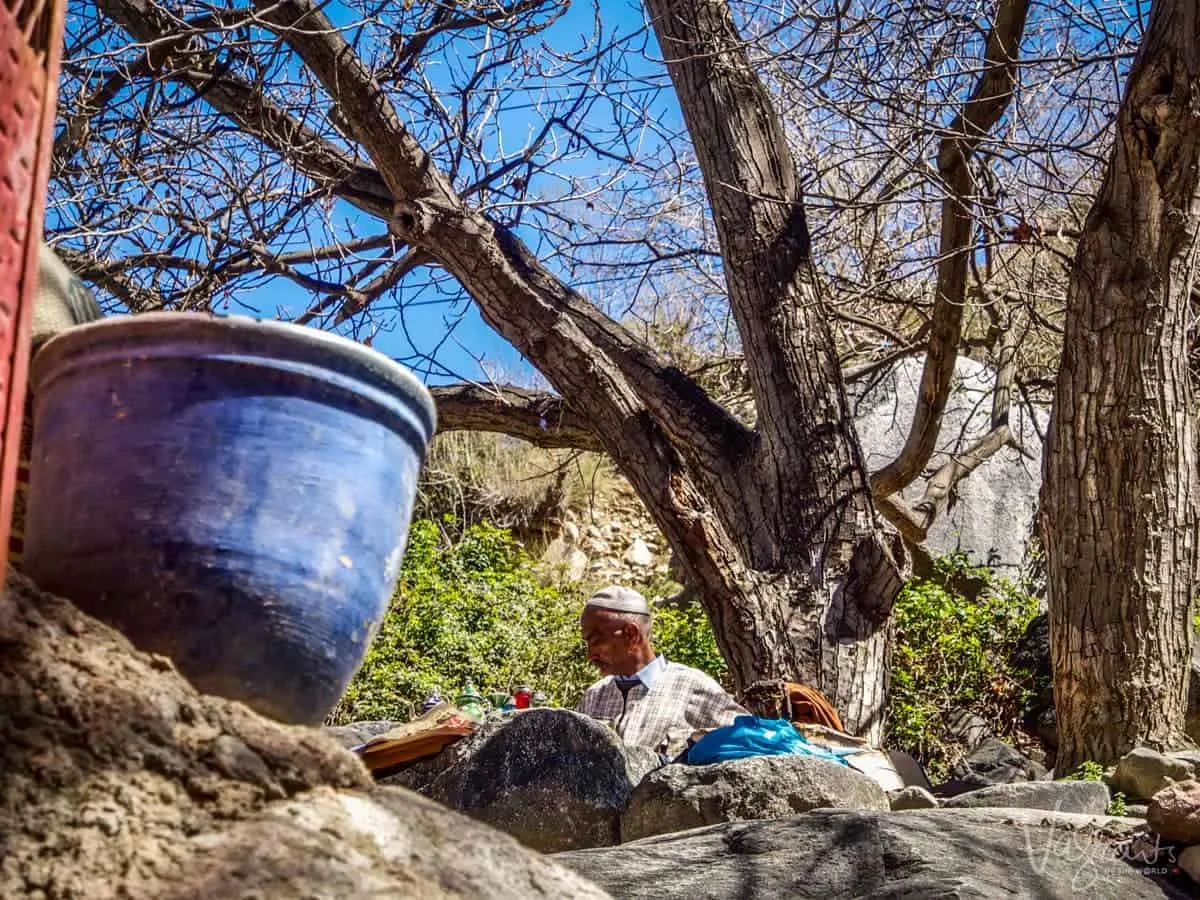 Local Berber man drinking coffee in the Middle Atlas Mountains Morocco