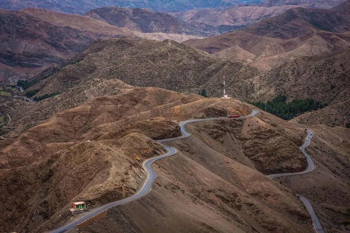 Crossing the high Atlas Mountains along a windy road which sits atop the mountain ridges.