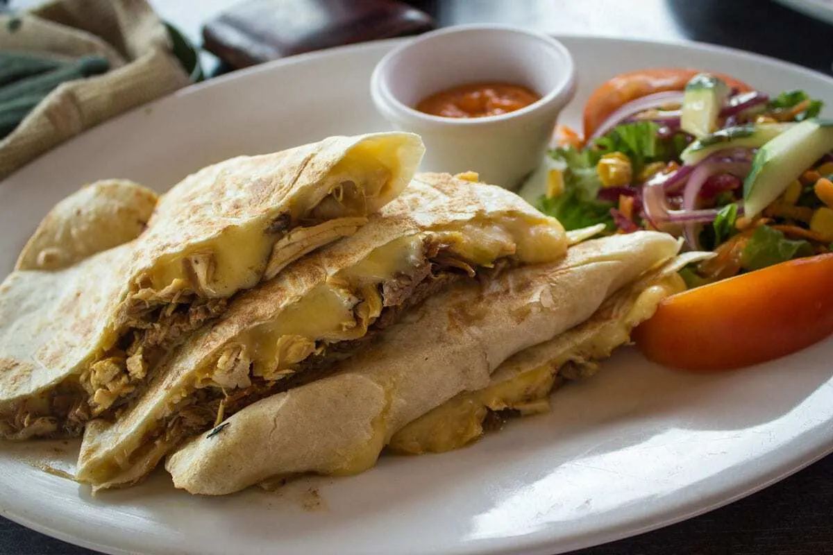 A plate of Quesadillas and salad in Costa Rica. 