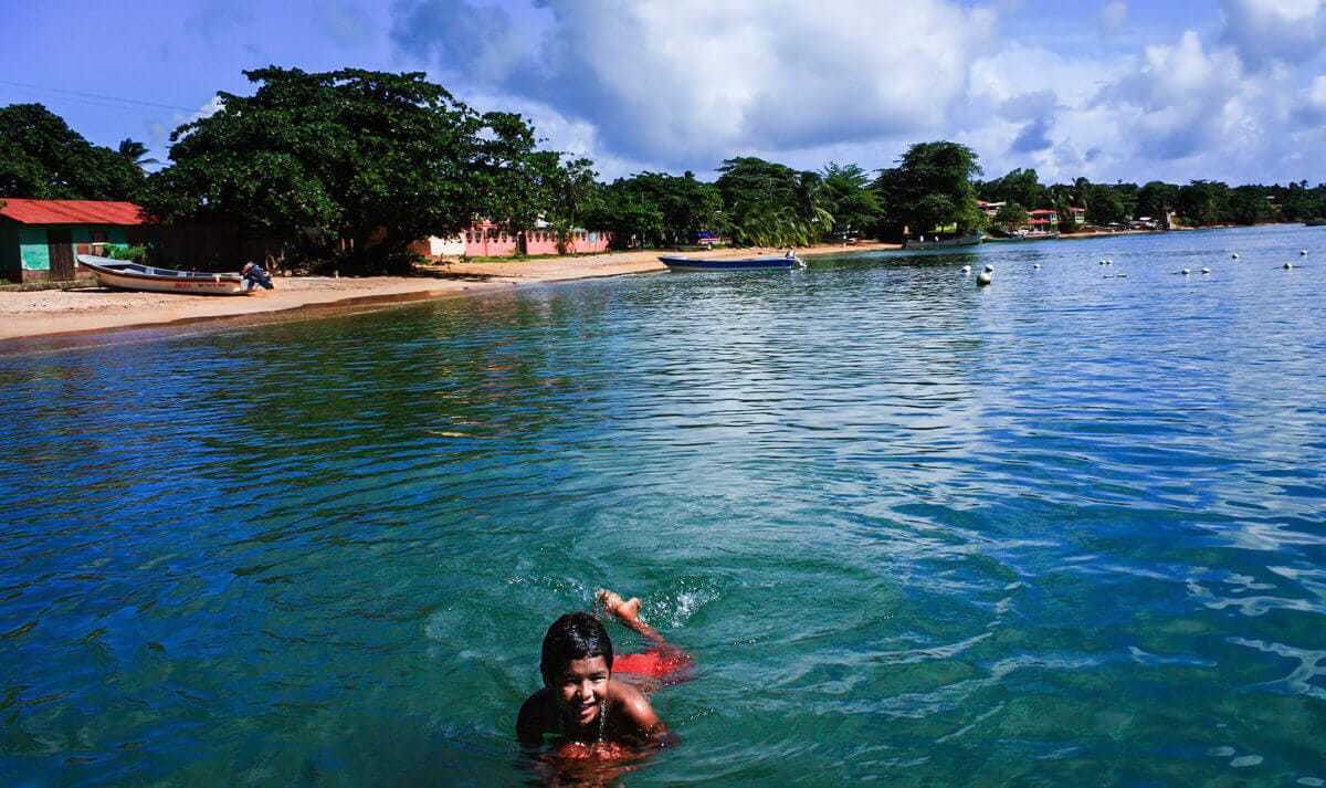 child swimming in Corn Island 