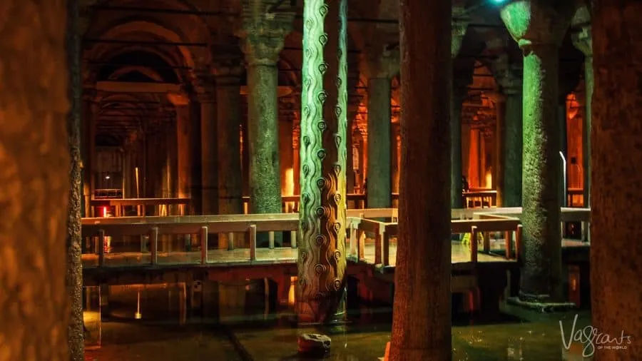 Columns with tears and hens eyes carved into them in the Basilica Cistern.