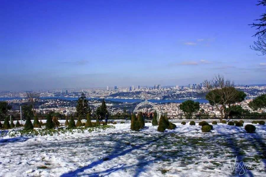 The view over Istanbul and the Bospherus from snow covered Camlica Hill. 