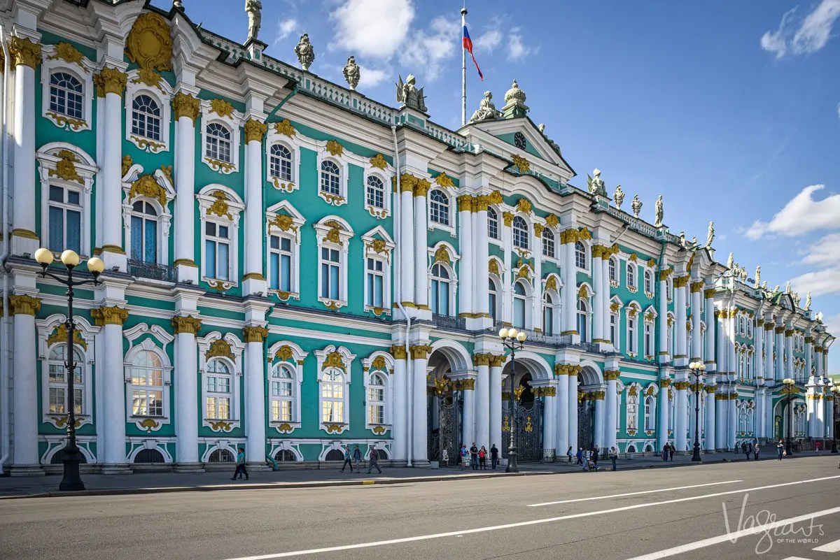 The famous blue and white building with gold pillars in St Petersburg Russia is the Hermitage Museum. 