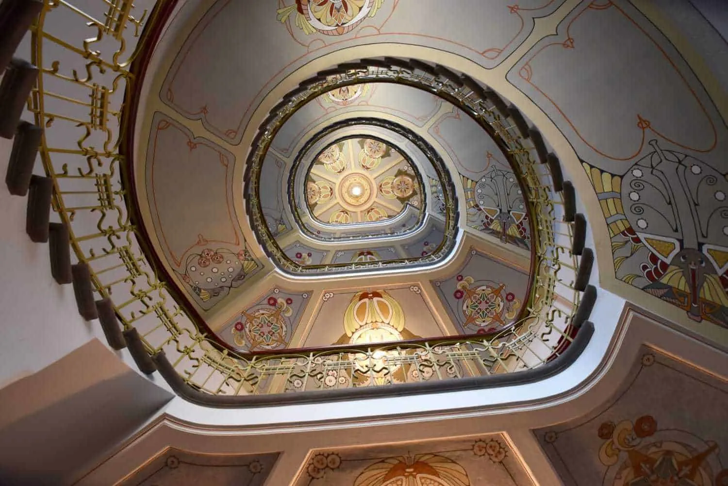 Intricate balistrades and staircase in Art Nouveau Museum Riga, Latvia. Checking this place out is one of the best things to do in Riga. To see the staircase is free, but entry to the museum is a small cost.