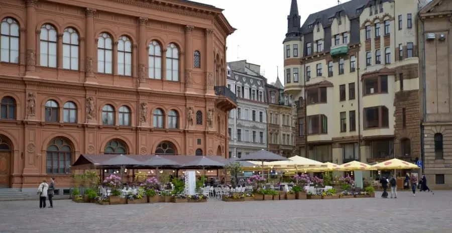 flowers surrounding restaurants in the square of Riga Old town. best places to eat in riga