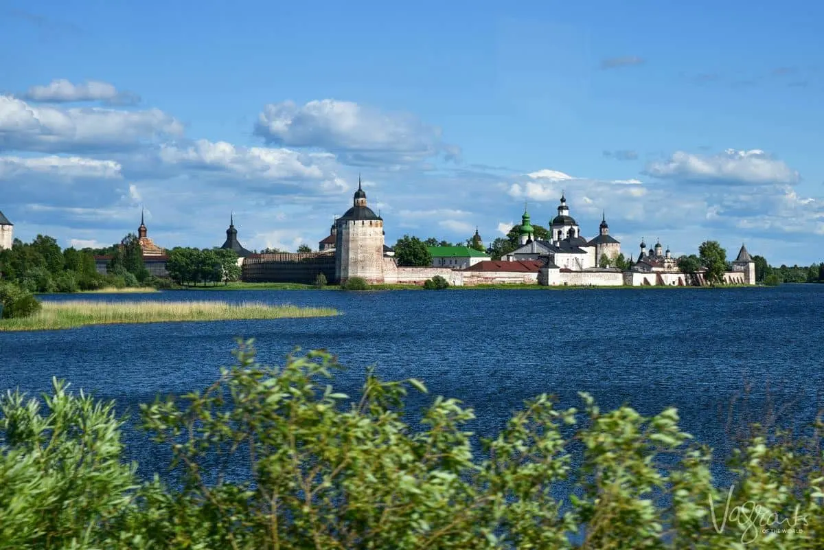 the Kirillo - Belozersky Monastery set against the river with 5 steeples around the outer perimeter.