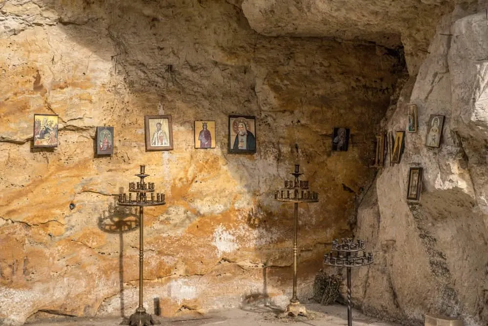 Paintings and candle sticks in the Rock Churches in Ruse Bulgaria.