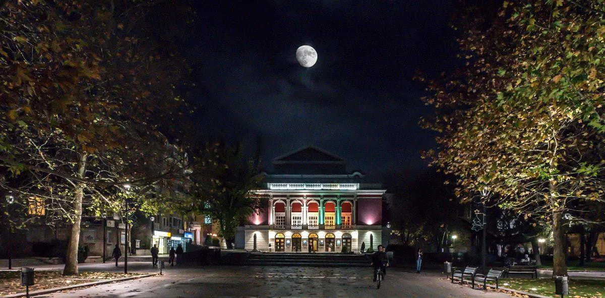 The Ruse Opera House at night with full moon in Bulgaria.