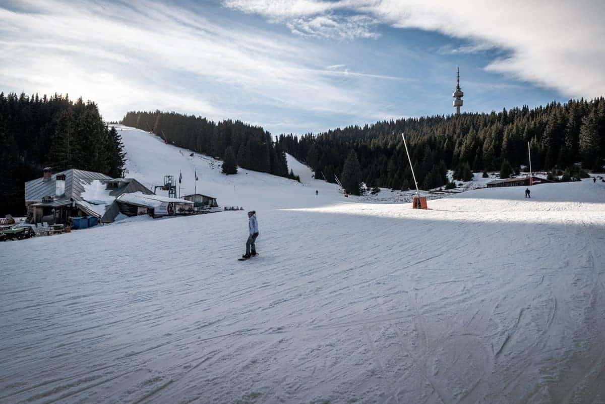 Young girls snow boarding in Pamporovo Bulgaria