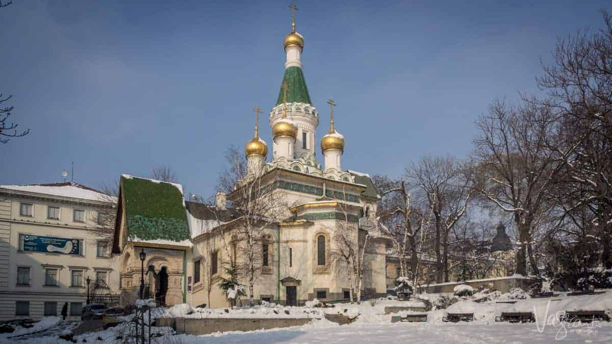 Snow covered onion dome church in Sofia Bulgaria. 