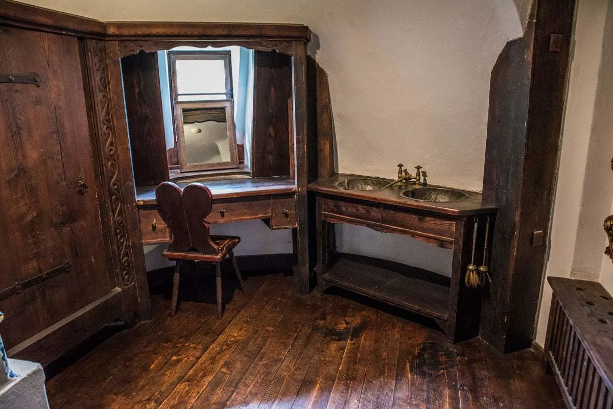 A dressing table, chair and mirror in Bran castle in Transylvania Romania.