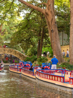 Colourful barges on the San Antonio River Walk