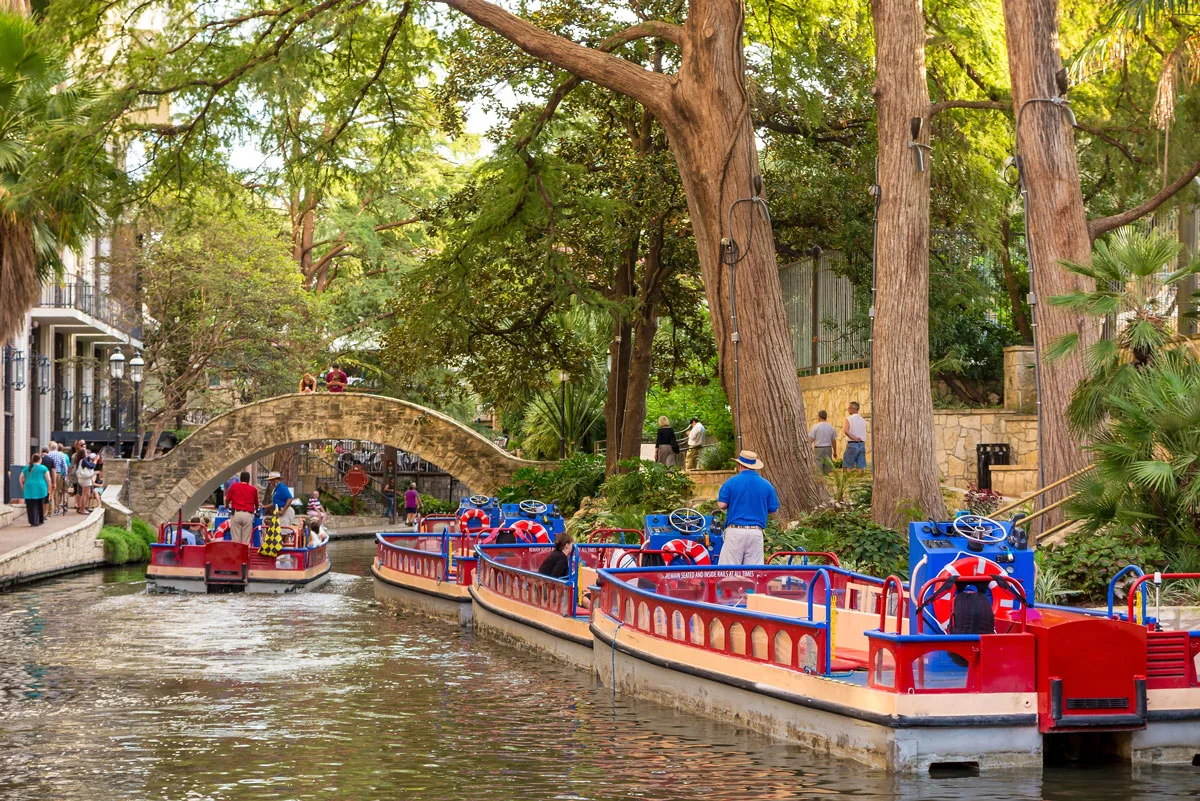 Colourful barges on the San Antonio River Walk