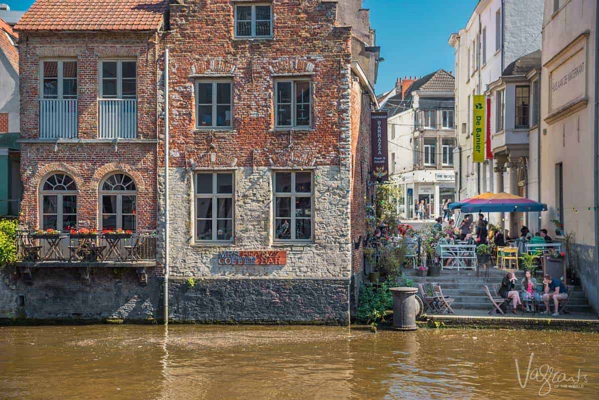 The Canals of Ghent are lined with colourful cafes and pretty houses. This is why visiting Ghent is one of the best things to do in Belgium