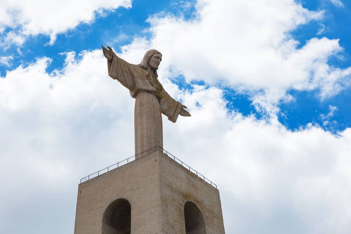 Looking up at the Cristo Rei, Christ the King Statue in Lisbon. 