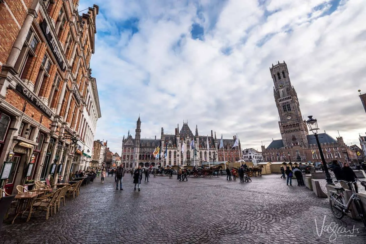 The medieval market square in Bruges Belgium. 