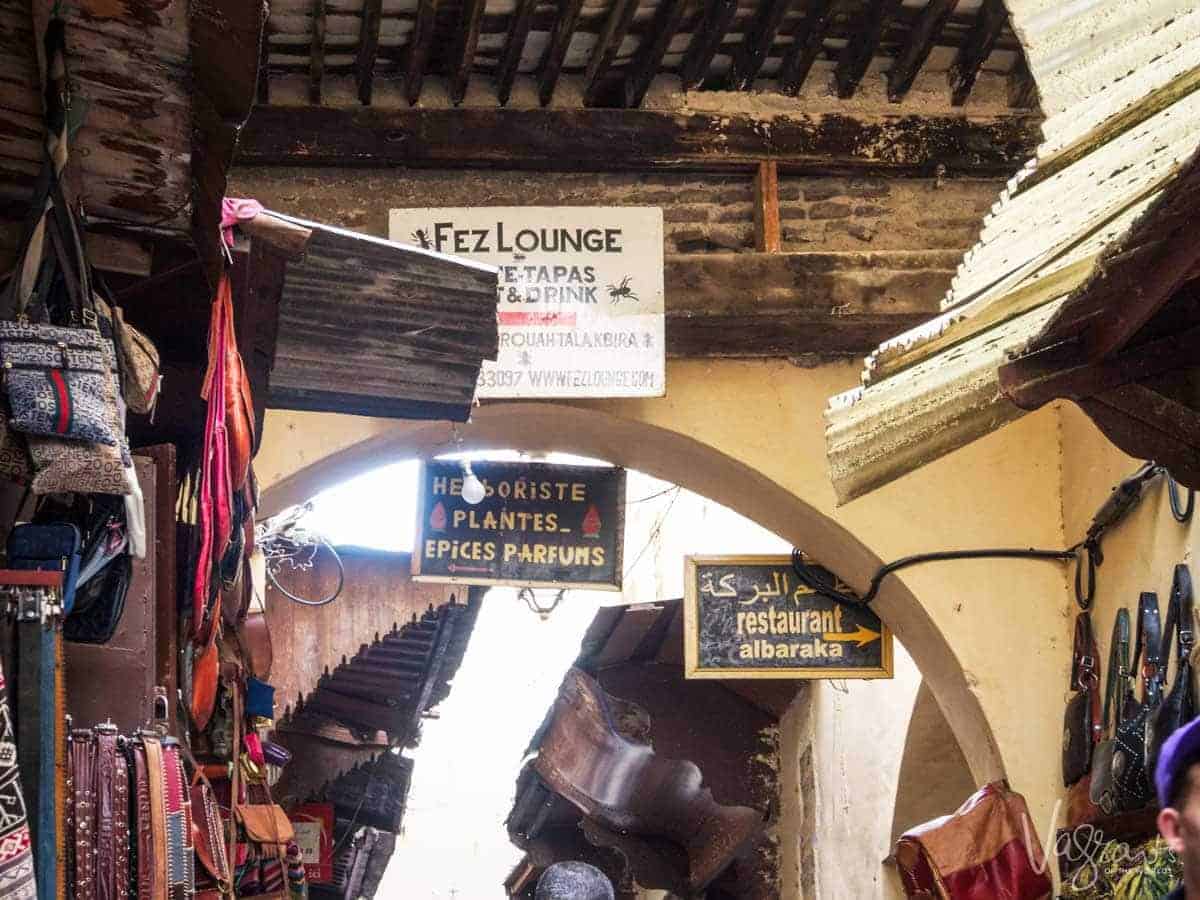 Signs in the Fez medina show the congestion of lanes and shops