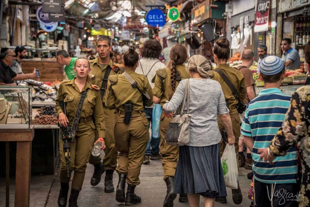 Photos of Israel - Military cadets walk through Jerusalem market