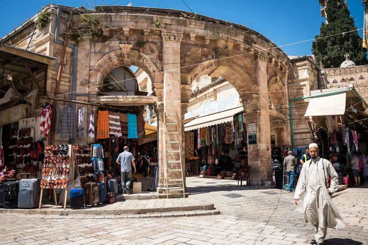 Photos of Jerusalem - Islamic man walks through Old City markets