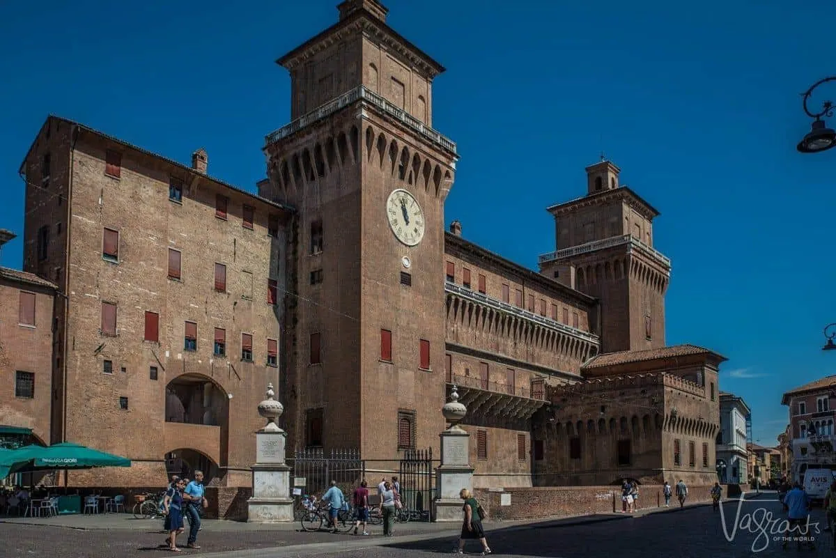 Historic clock tower on the square of Ferrara Italy.