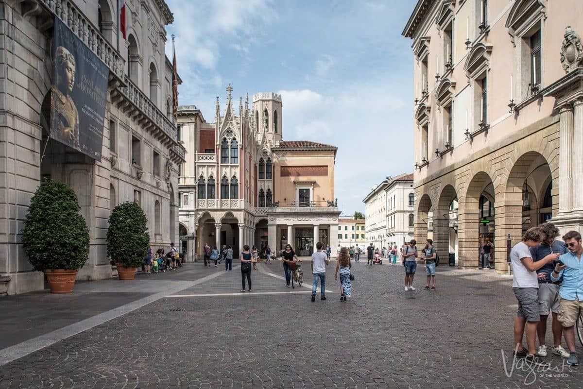 The streets of Padua Italy surrounded by historic buildings. 