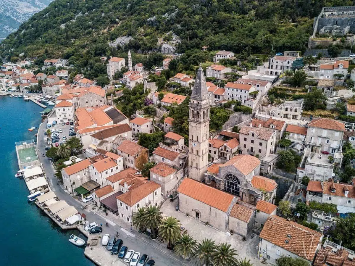 Aerial view of the town of Persat with typical red roofs on the Bay of Kotor Montenegro. 