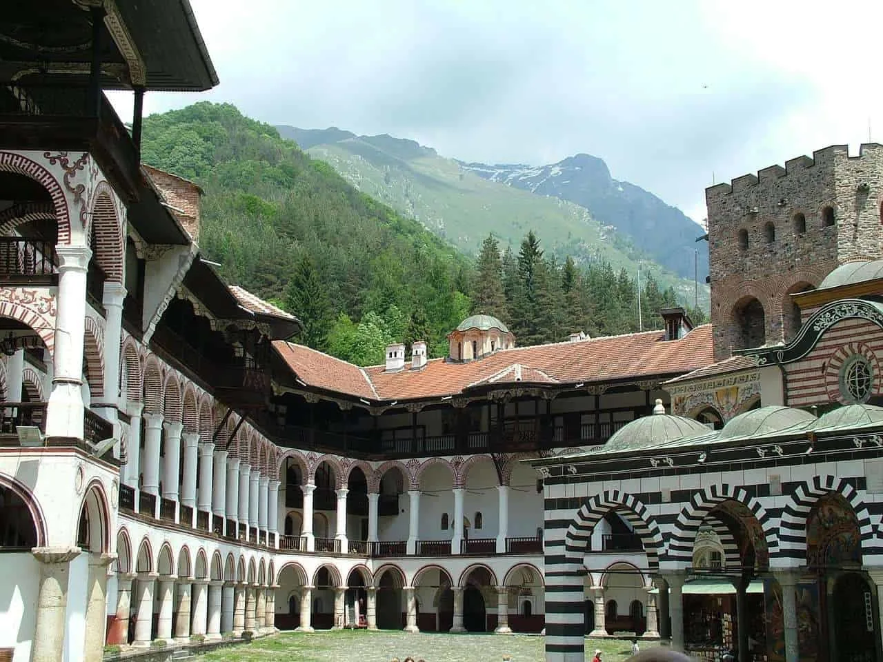 Monastery surrounded by mountains and countryside at The Rila Monastery.