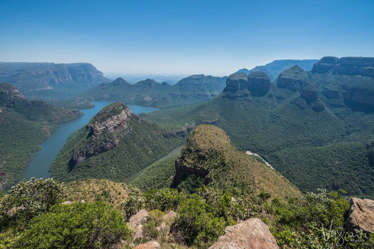 The Wonder View, from the peak looking out over a rock and undergrowth outcrop and down into the canyon with the river running through - Blyde River Canyon Panorama Route South Africa