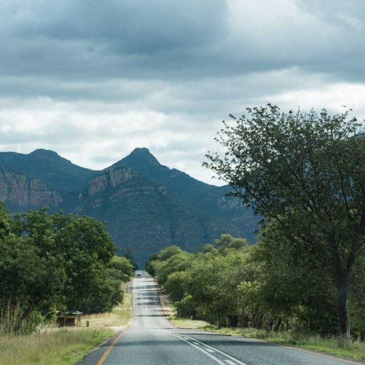 A long stretch of road along the Panorama Route from Johannesburg to Kruger National Park, South Africa. How long does it take to drive the Panorama Route, you can do it in 1 day