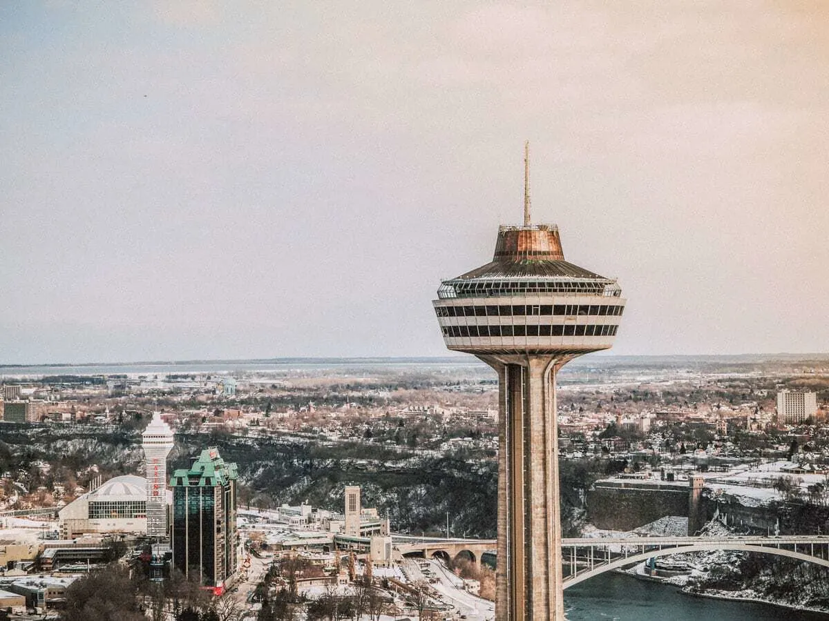 The observation deck of the Skylon Tower in Niagara Falls City with the view across the tower down over the city and river. This is one of the best places to visit in Canada