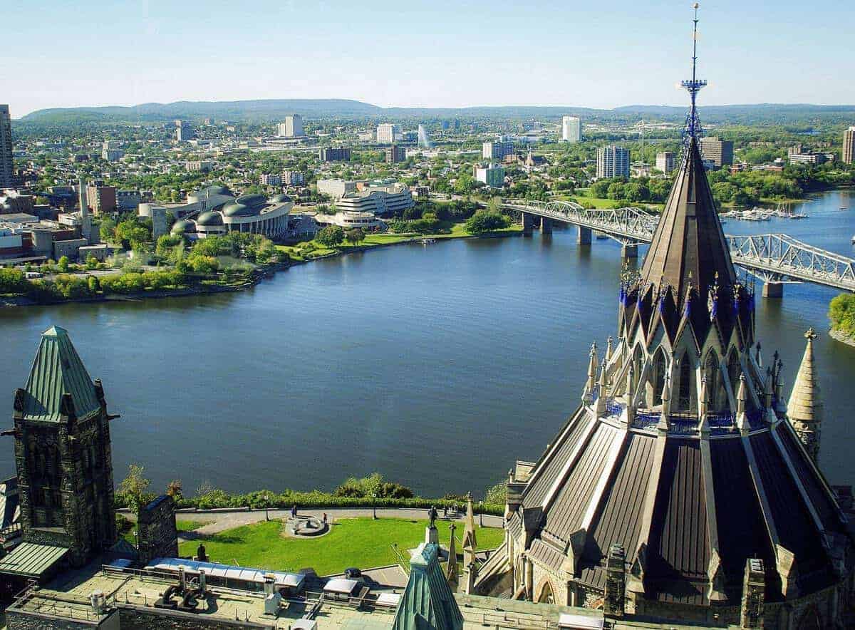 Av view across the greenery to the river and city of Ottawa one of the best cities to visit in Canada