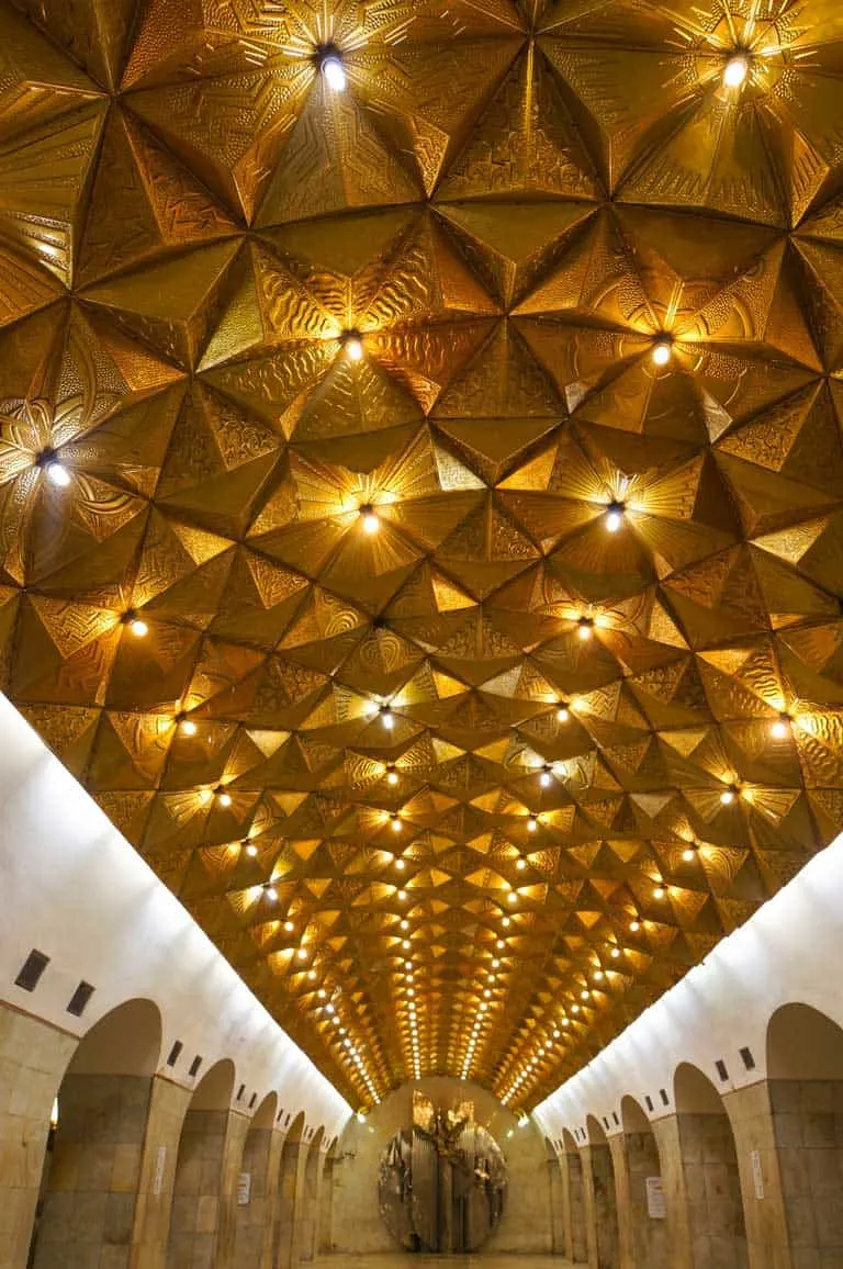 The gold pyramid ceiling in Aviamotornaya Station on the Moscow Metro.