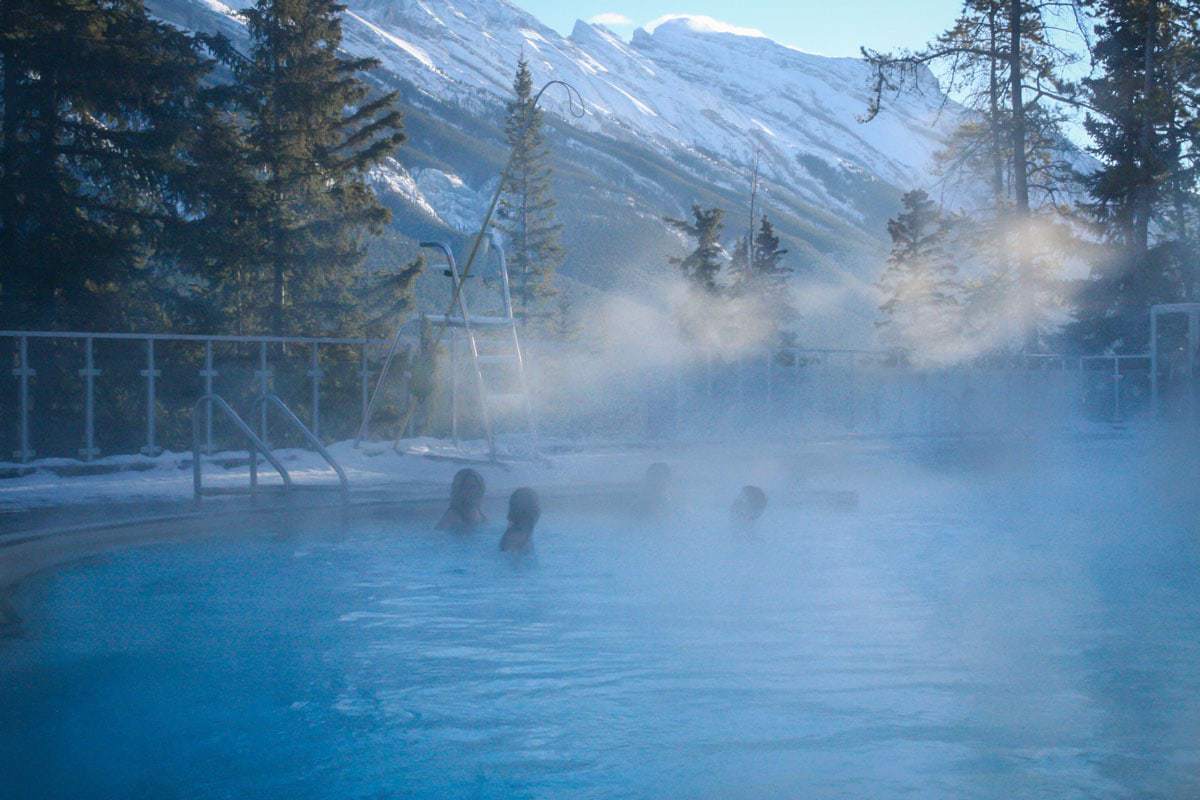 People soaking in Banff Upper Hot Springs.