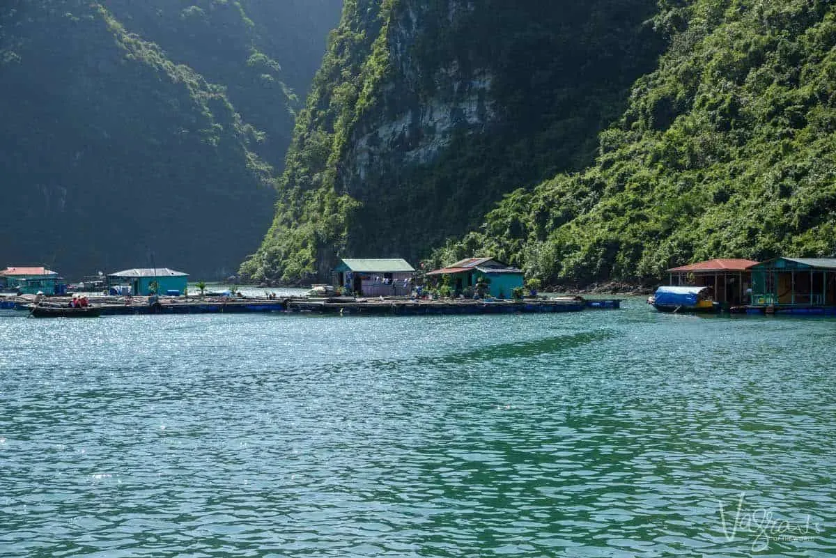 Small huts on the floating fishing village of Cua Van Village.