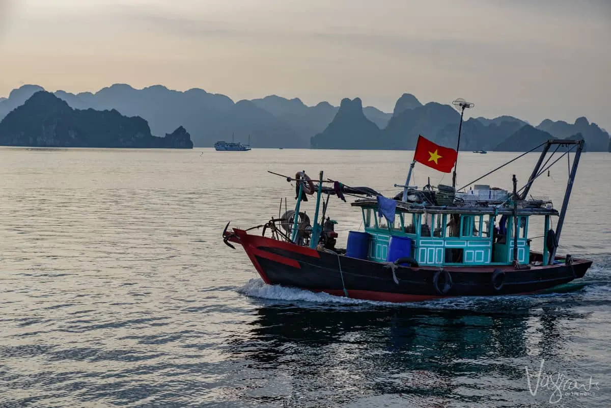 A traditional, colourful Fishing boat in Halong Bay Vietnam.