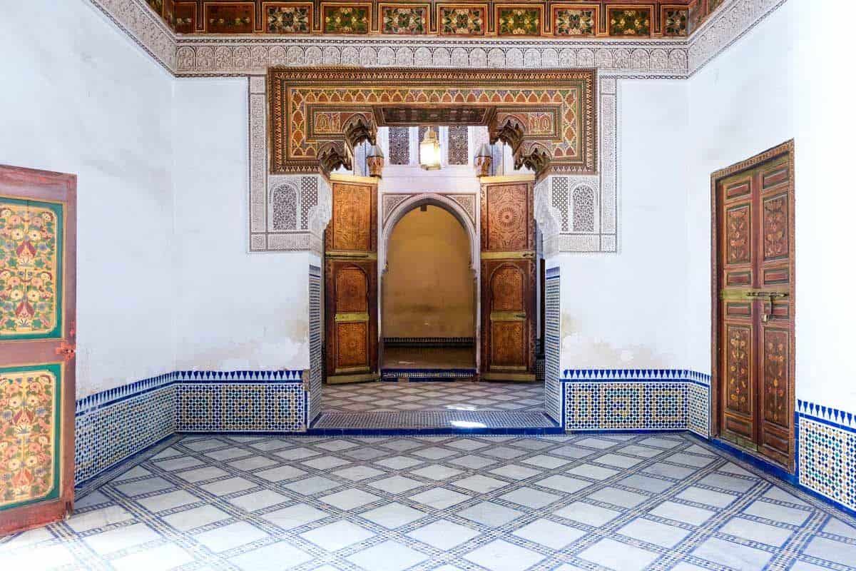 The interior of the opulent Bahia Palace with intricate tiles and wood carvings. One of the most important tourist attractions in Marrakech