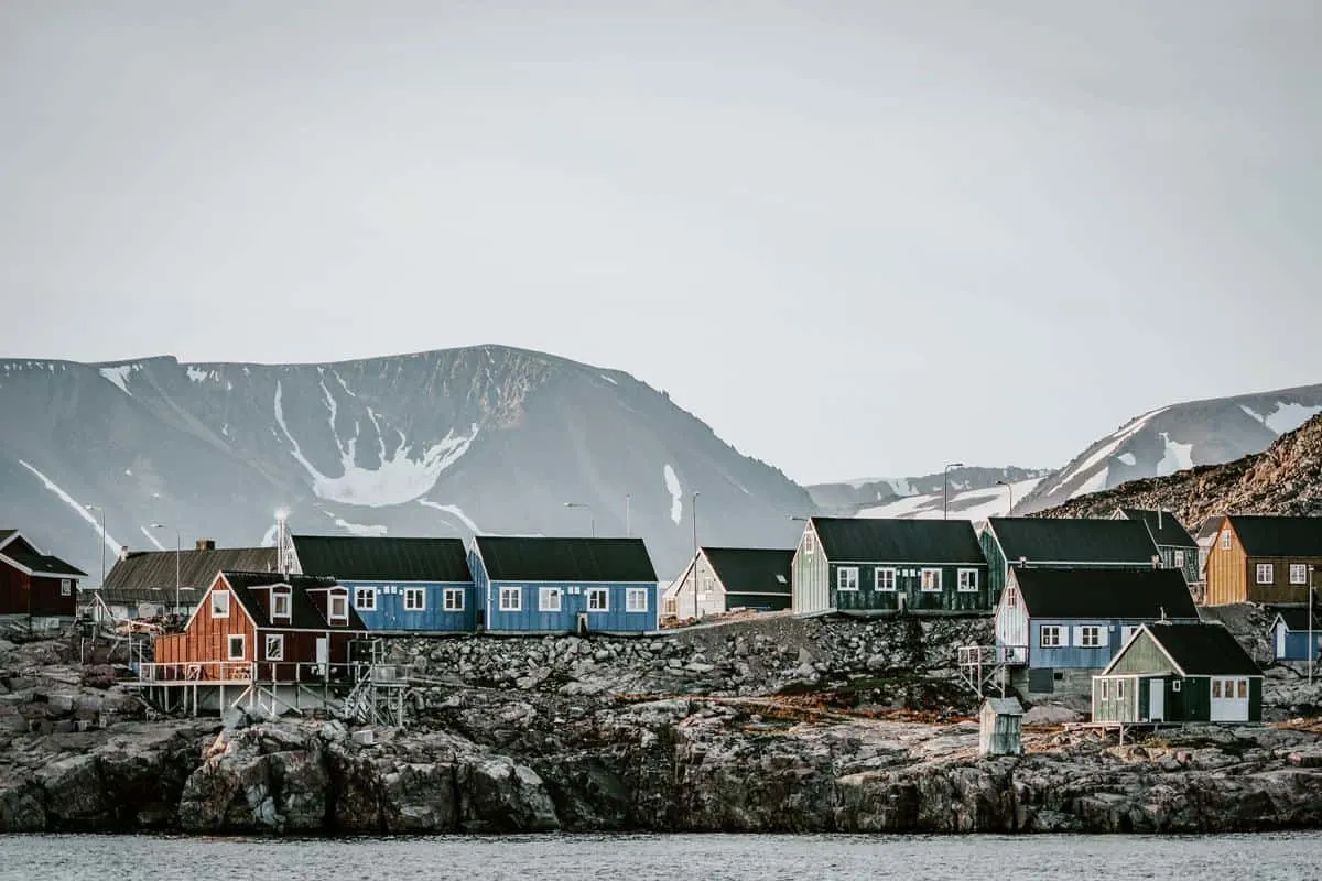 Local village houses in Greenland during a port of call on Greenland cruises