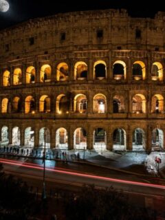 Long exposure photo of the Roman Colosseum at night.