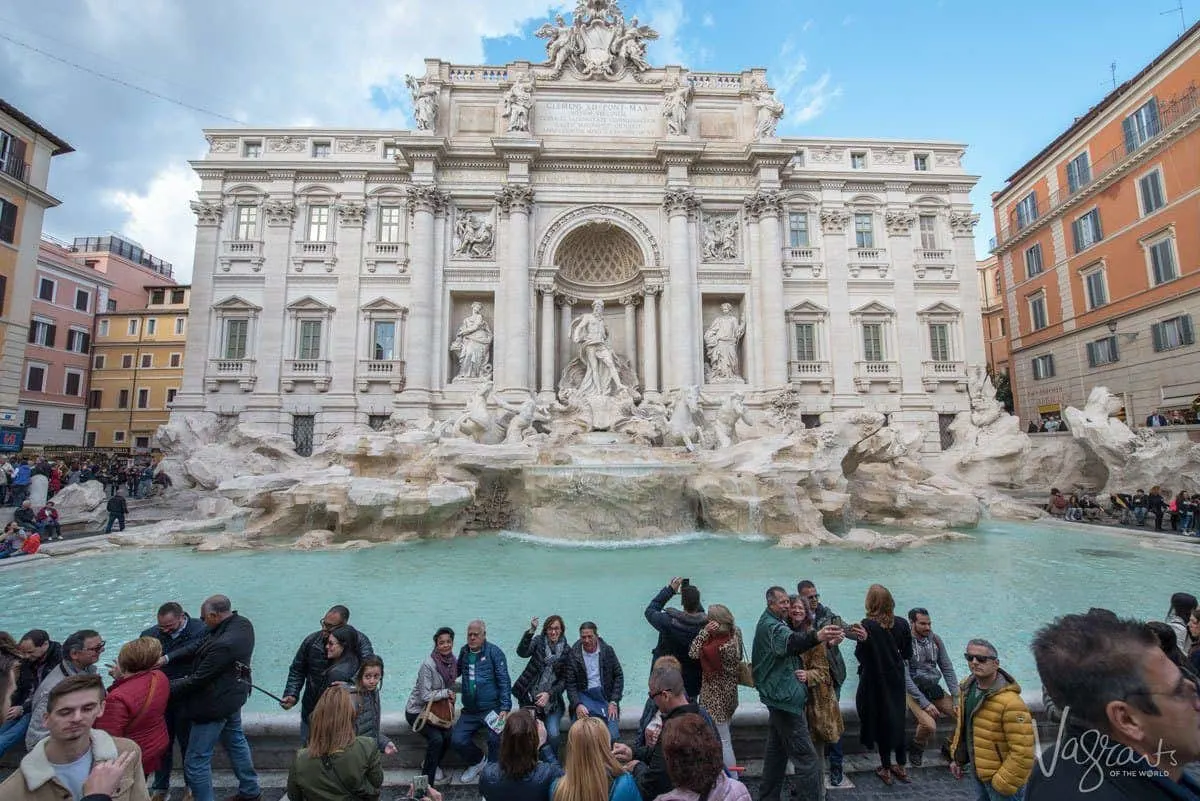 Tourists gathered in front of the Trevi fountain in Rome. 