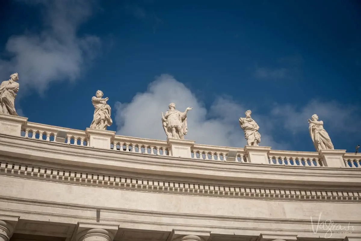 4 marble statues of apostles atop the Vatican. 
