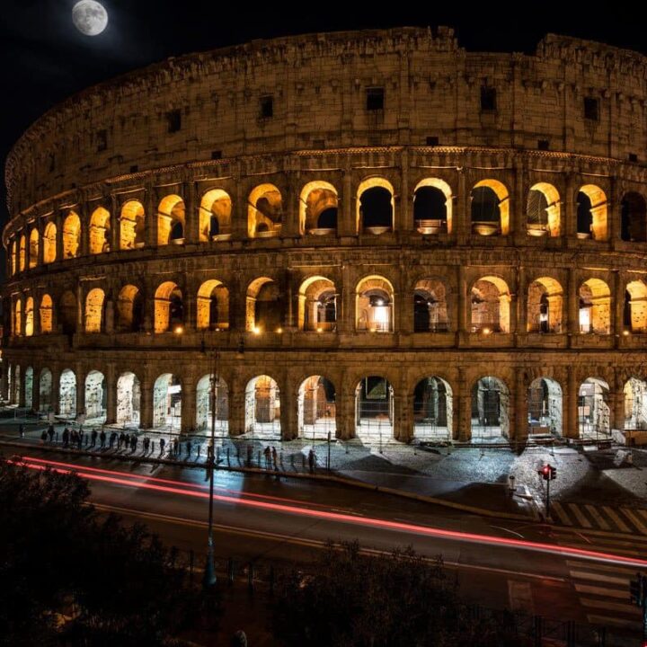 Long exposure photo of the Roman Colosseum at night.