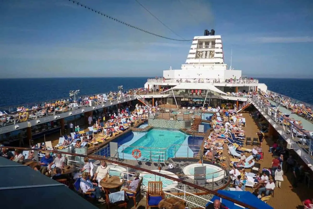 Cruise ships are like small cities as you can see by all the people around this ships pool. Keep your valuables safe by the pool with a good anti theft bag or leaving valuables in your room.