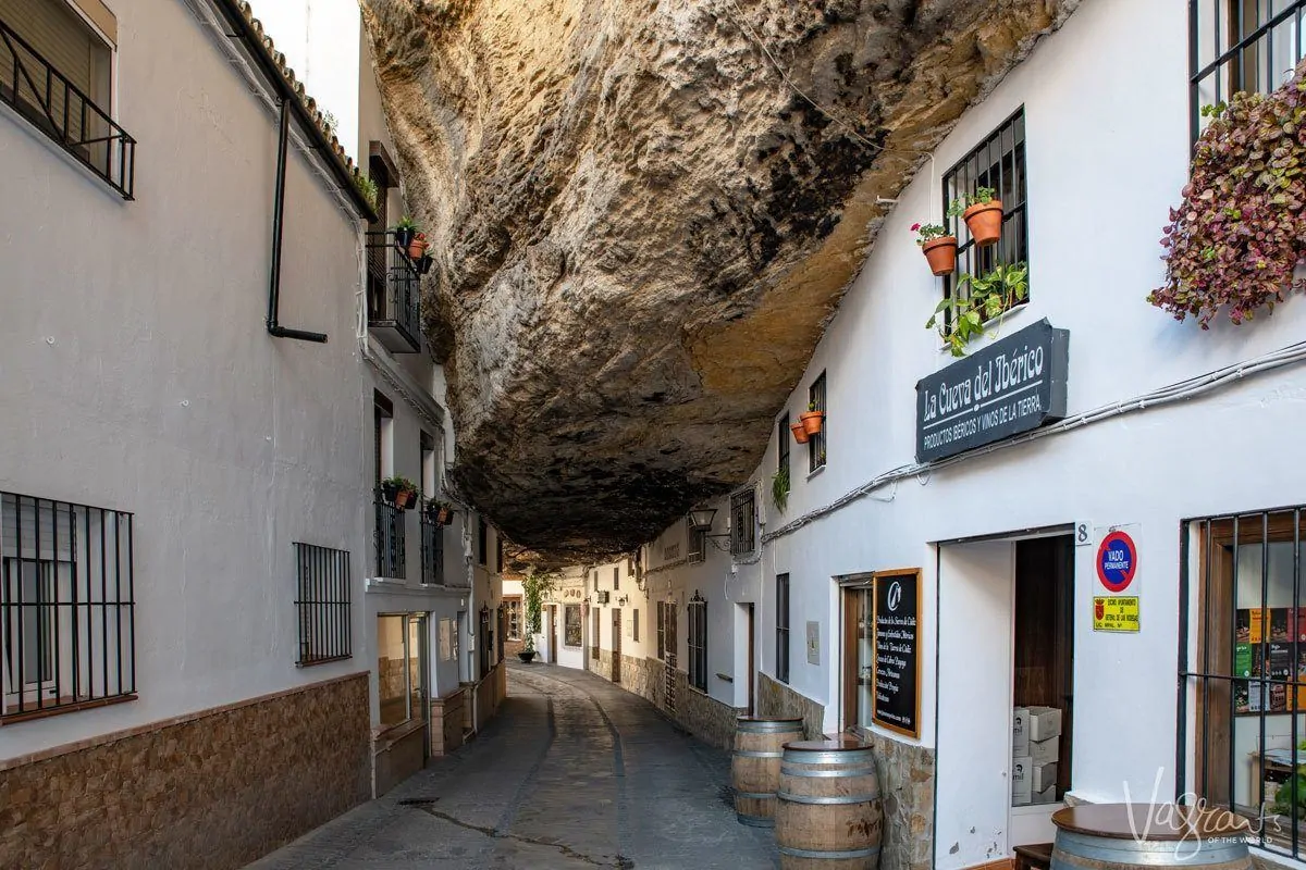 Giant rock hanging down between the two sides of the street in Setenil de las Bodegas. 