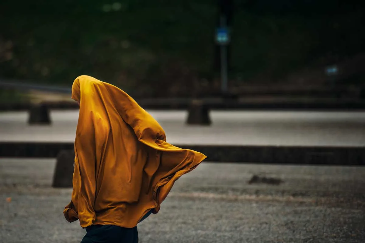 Safe Travel Tips - Dress Appropriately - Woman in burka