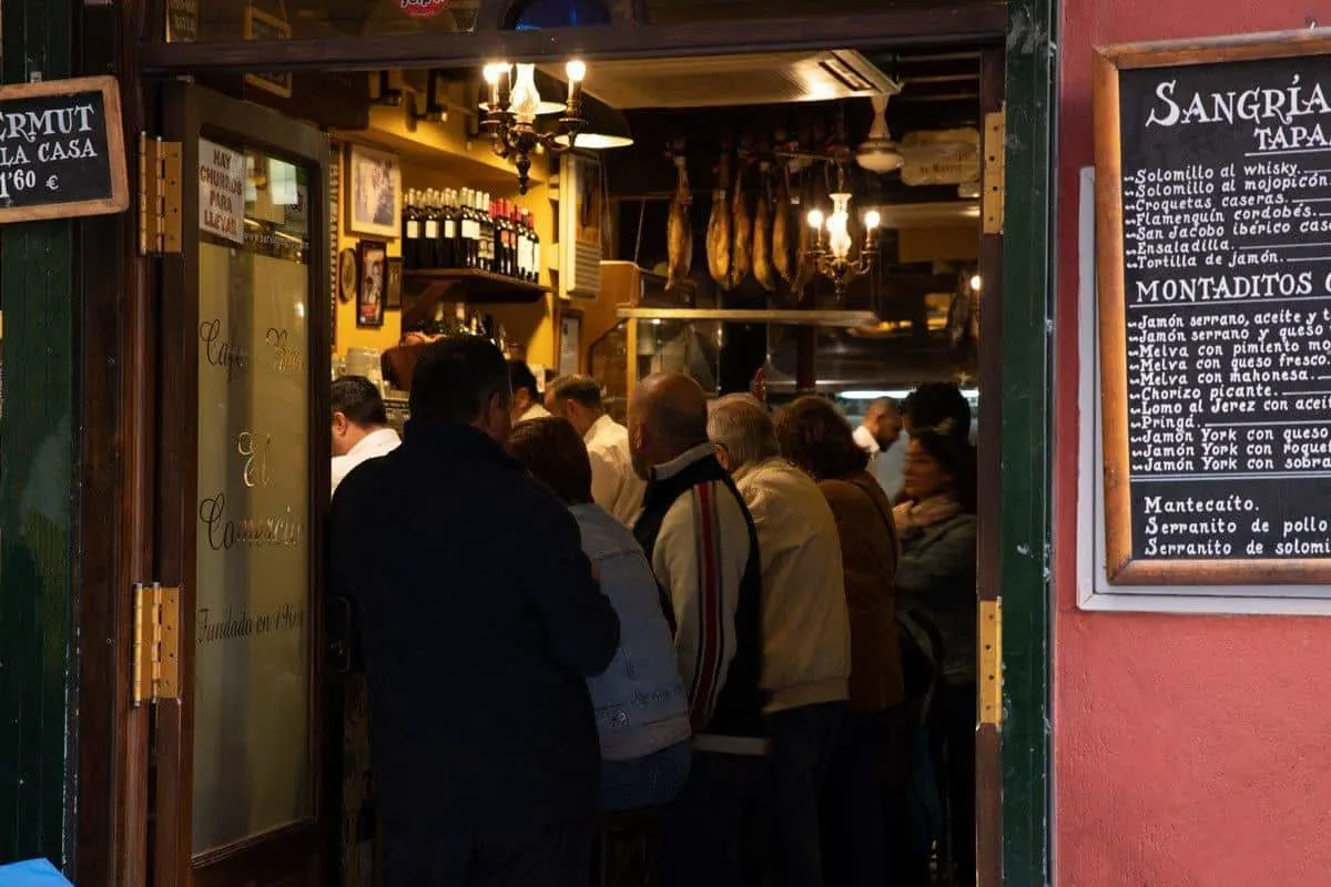 A crowded tapas bar in Seville. 