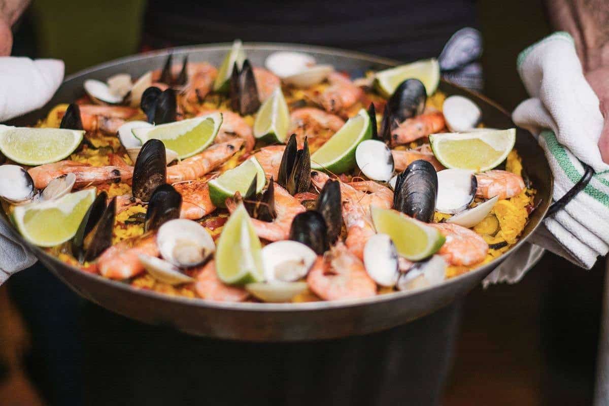 Prawns, mussels, limes and rice, enjoying Paella in Seville