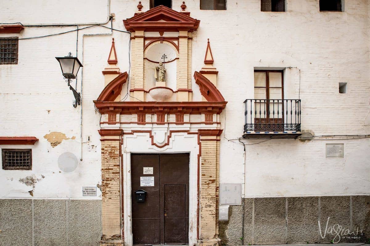 Old doorway and religious icons at Convento de San Leandro Seville. 