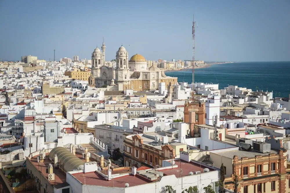 white roof tops and church in Cadiz. This a one of the best Day trips from Seville to Cadiz