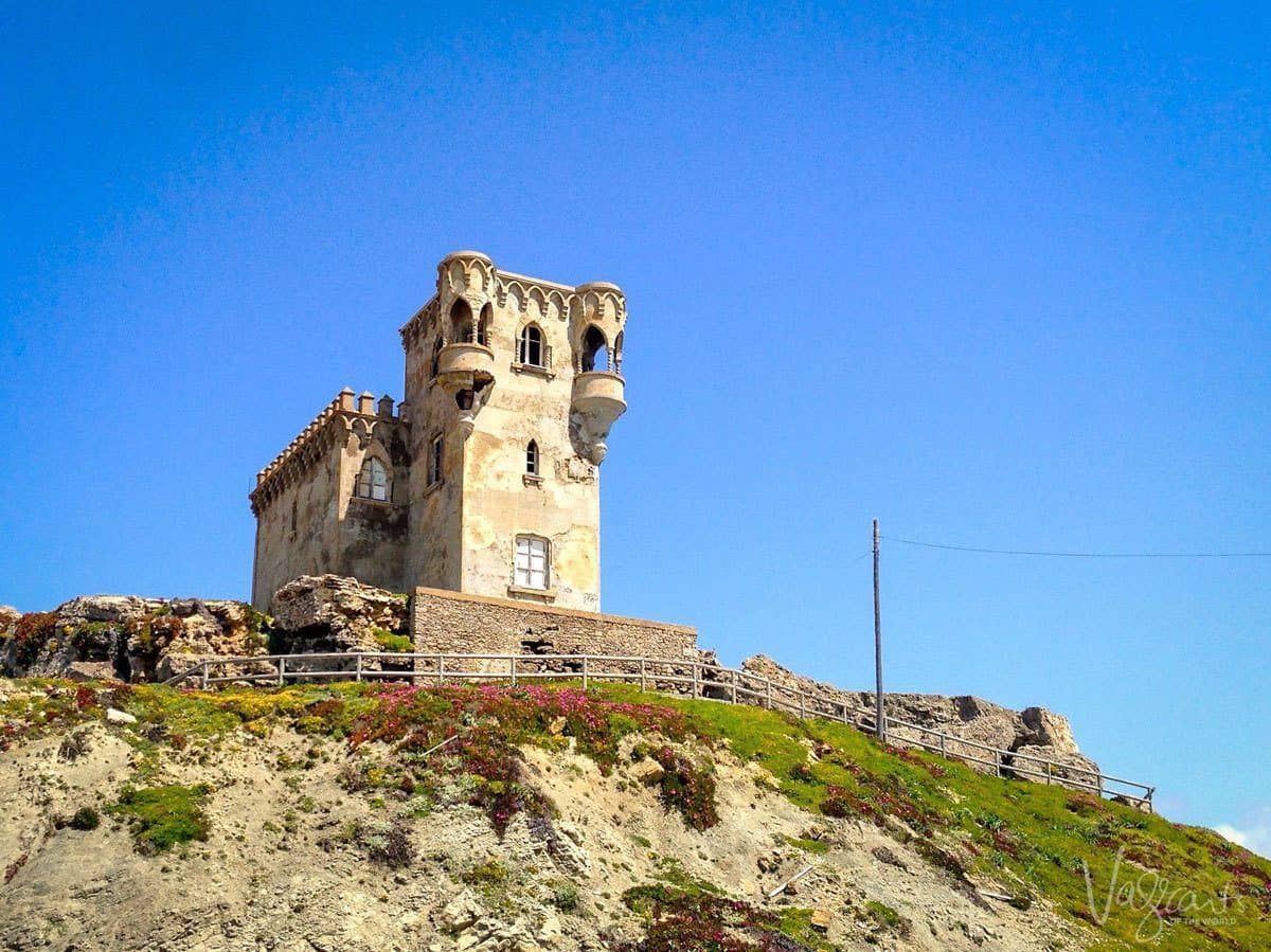 Small chalet with two turrets on hill top in Tarifa. Another great reason for Day trips from Seville to Tarifa